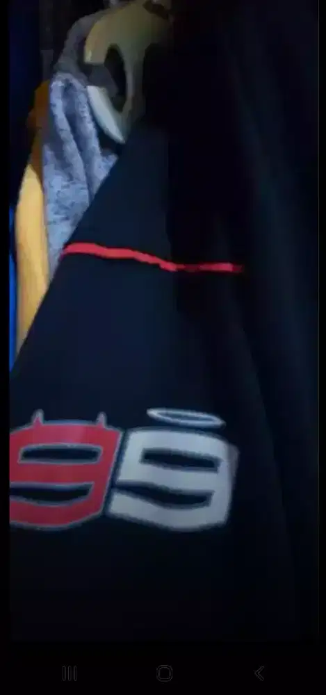 Uniqlo jaket motogp warna hitam