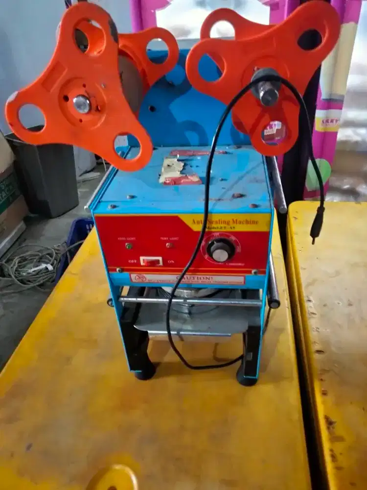 Mesin seal minuman automatic