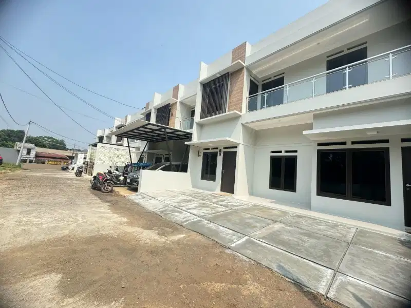 Dijual Rumah  dgn desain menarik nempel TOL CIBUBUR