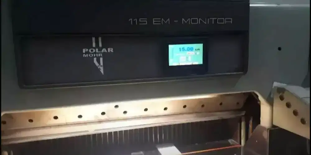 MODIFIKASI MESIN POTONG KERTAS OTOMATIS