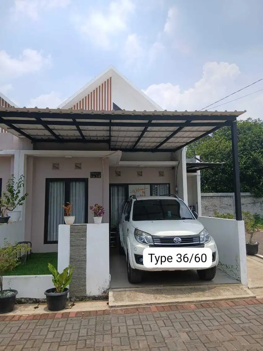 RUMAH EXCLUSIVE FASILITAS SMART HOME DAN CCTV BONUS KANOPI CANTIK