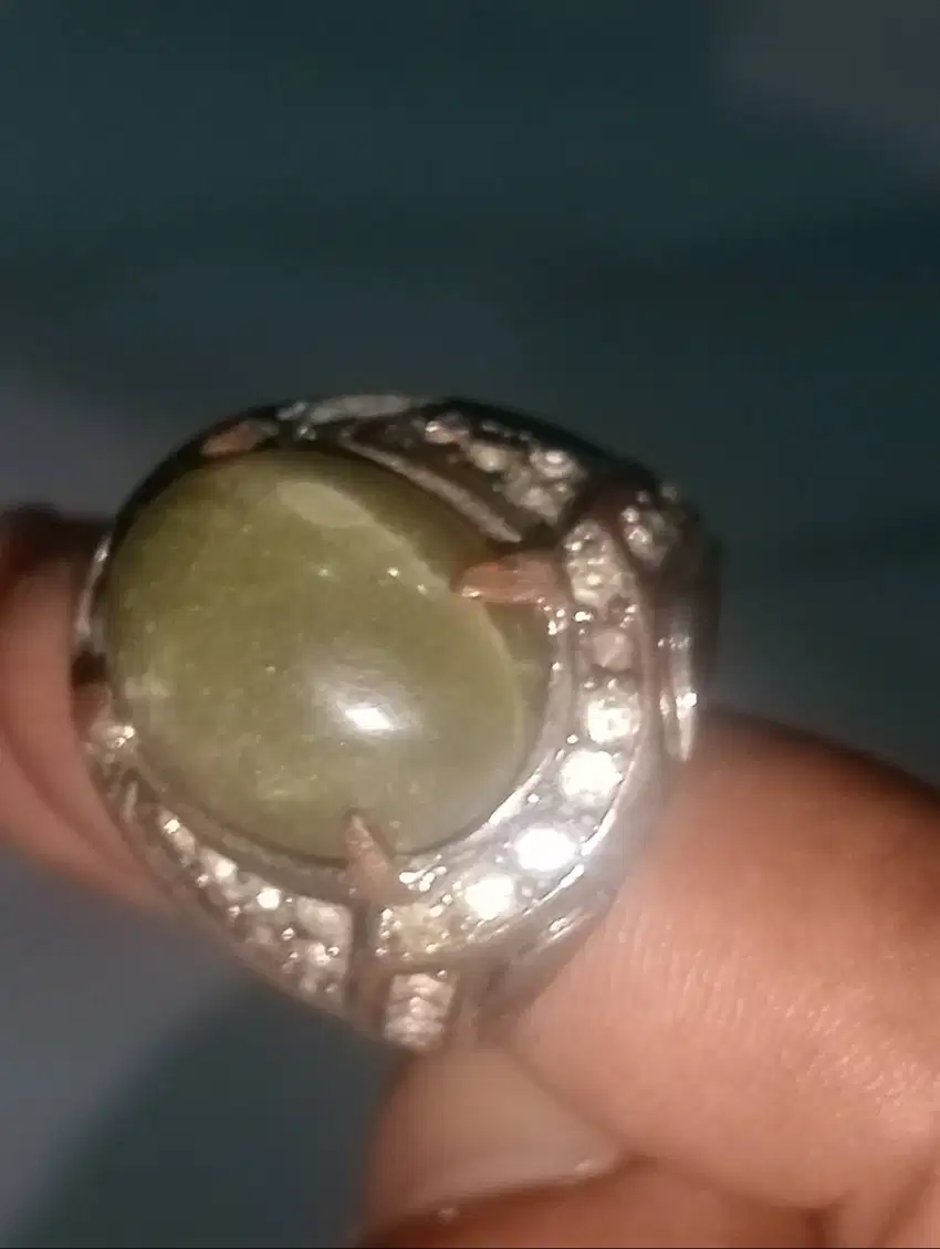 Cincin batu lumut aceh disenter tembus