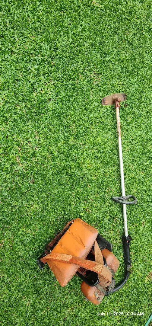 Mesin potong rumput 2 tak bensin