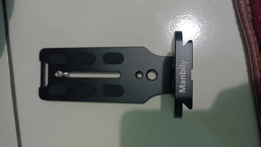 Merk Manbily universal utk Camera miroles/dslr di tripod