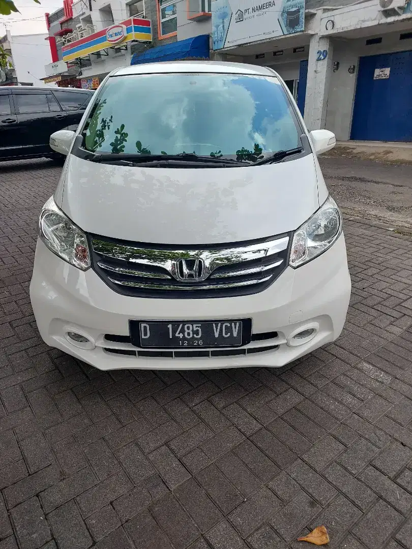 Freed 1.5 E PSD matik 2013 ac doble