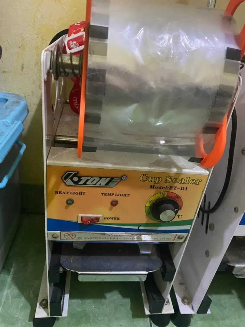 Mesin cup sealer