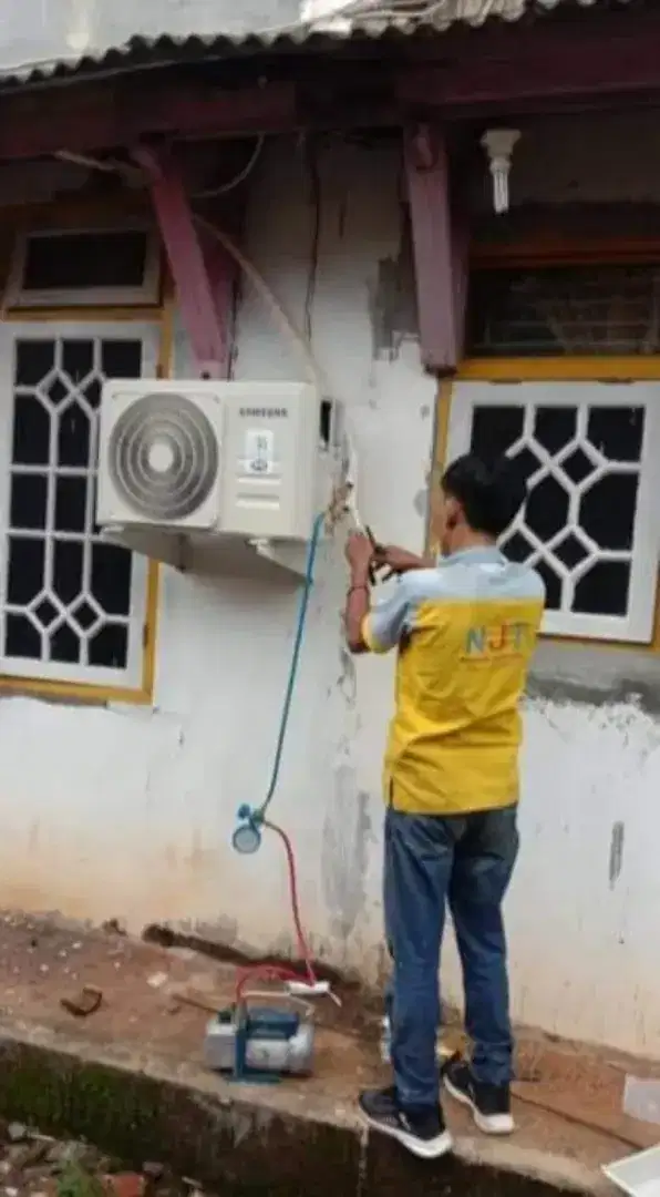 Servis kulkas, mesin cuci, pompa air, dll