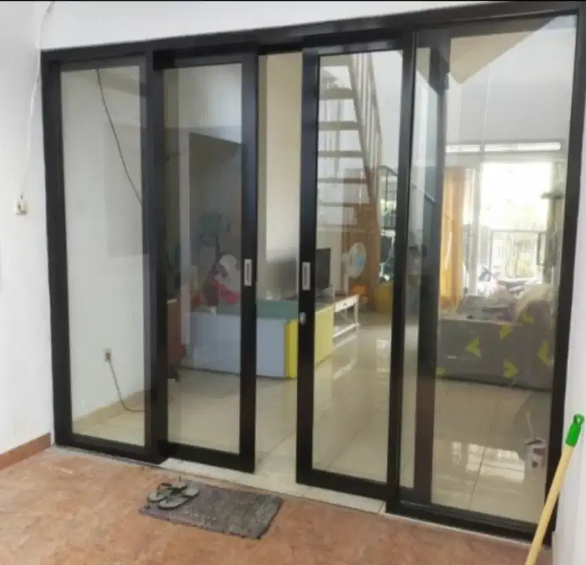 Pintu sliding 2 daun gandeng kaca mati kanan kiri