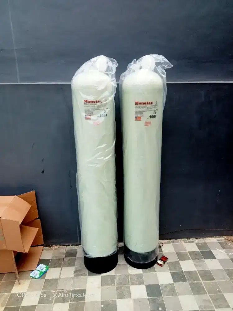 Pemasangan filter air dan instalasi pipa air dan sumur bor