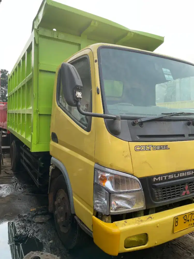 Mitsubishi Colt Diesel 125 Ps dobel 6 roda tahun 2017 dumptruk 9 kubik