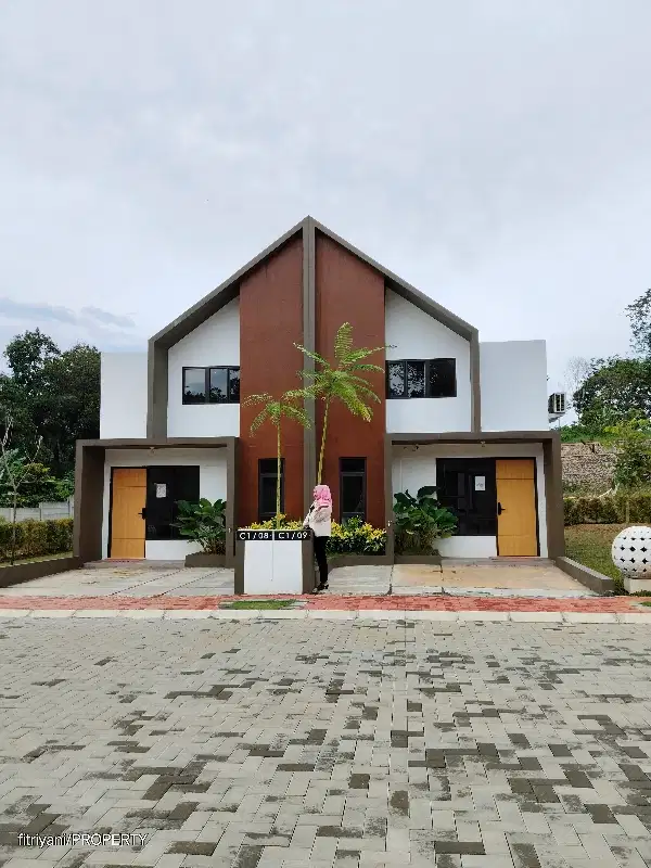 Beli rumah dapat mobil