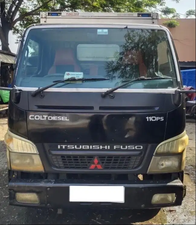Mitsubishi Canter Colt Diesel Engkel BOX PUMA FE71 110PS  tahun 2009