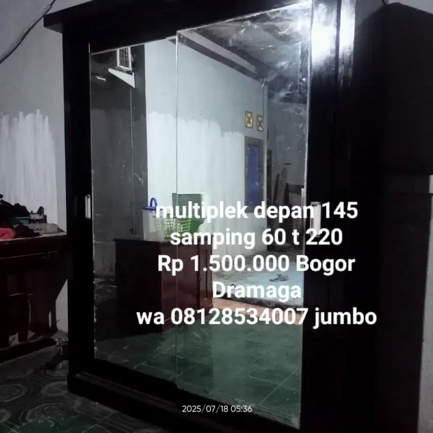 Jumbo lemari multiplek bekas Bogor kaca ok tebal geser aliding