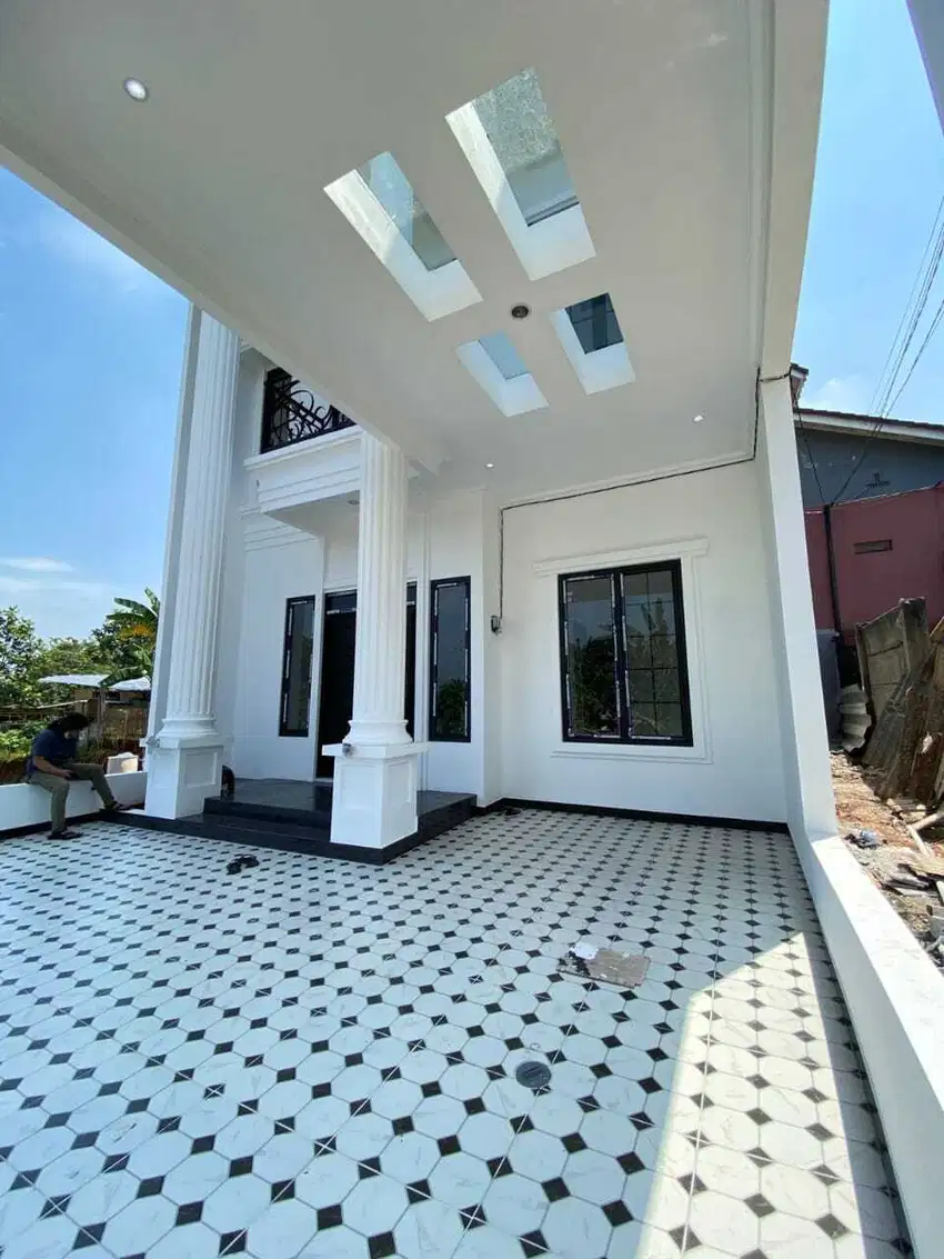 Sebuah Hunian Dalam Cluster  Dengan Dengan Desain Klasik Eropa.