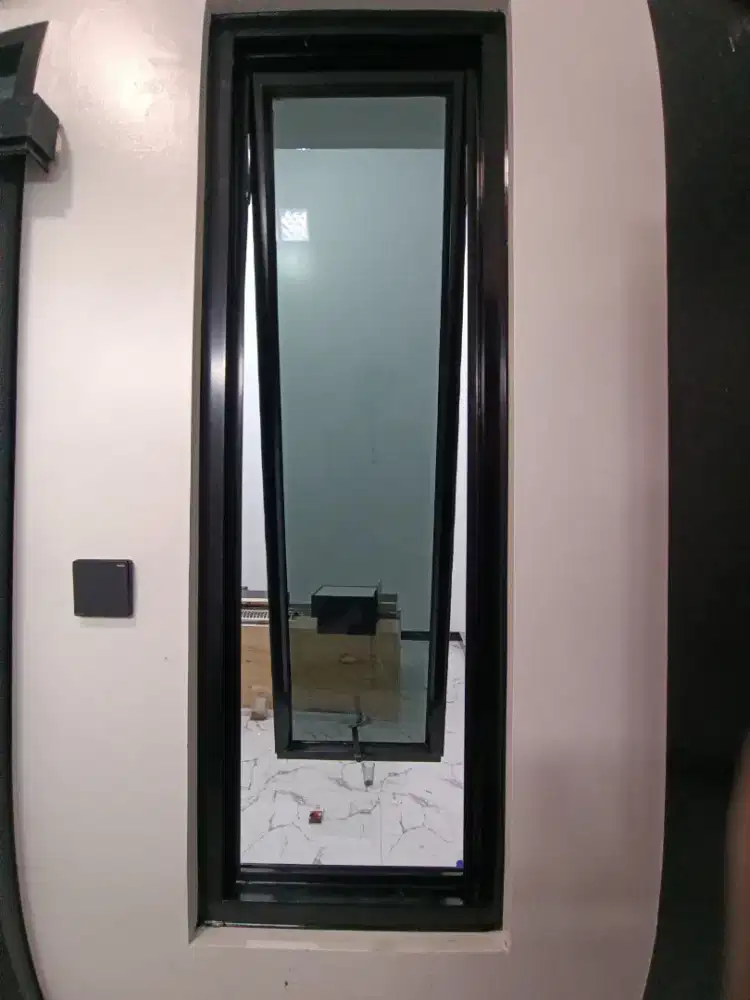 Pemasangan kusen pintu jendela aluminium