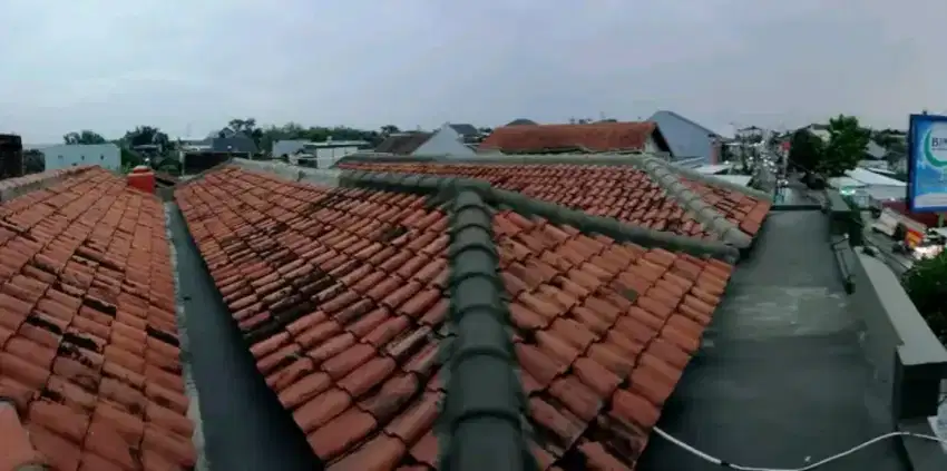 TUKANG RENOVASI PERBAIKAN ATAP BOCOR DINDING DAK REMBES TALANG AIR CAT