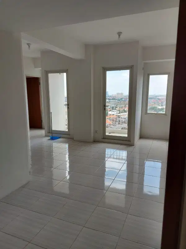 dijual murah apartm CBD 2 unit jadi 1 ,ruangan luas,di lantai 8