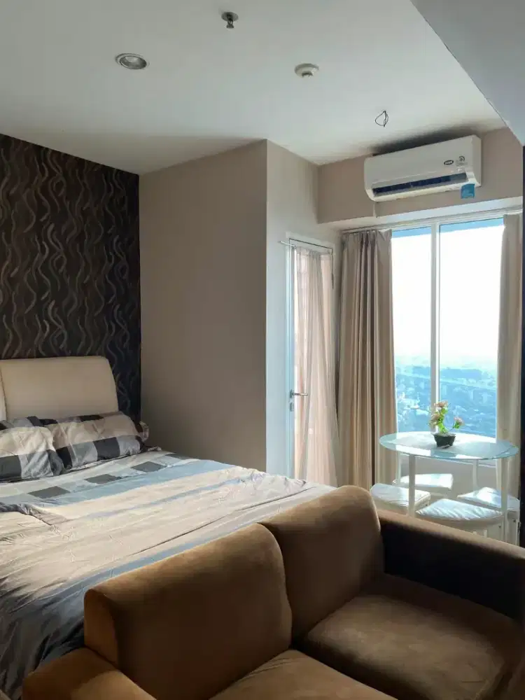 Sewa murah bulanan apartemen grand kamala lagoon