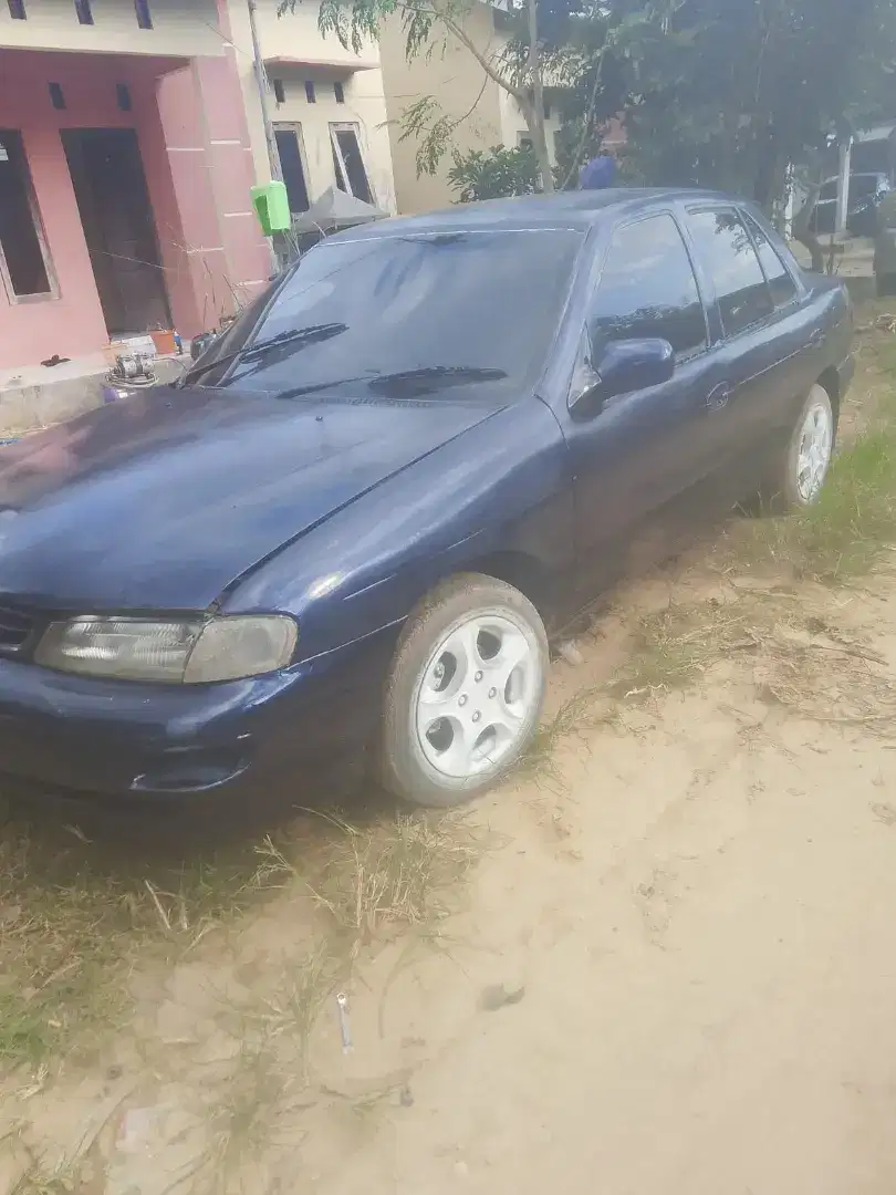 Sedan timur tahun 2002 ss lngkp pjk of