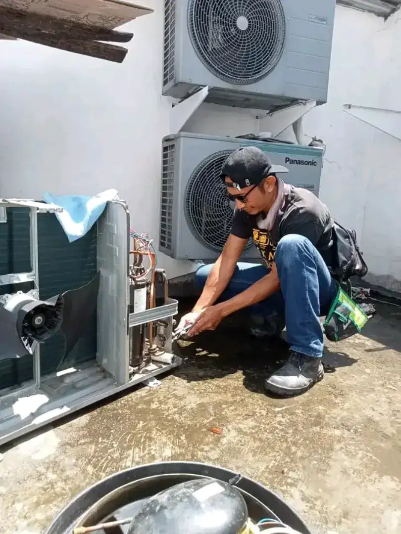 SERVICE AC BONGKAR PASANG AC