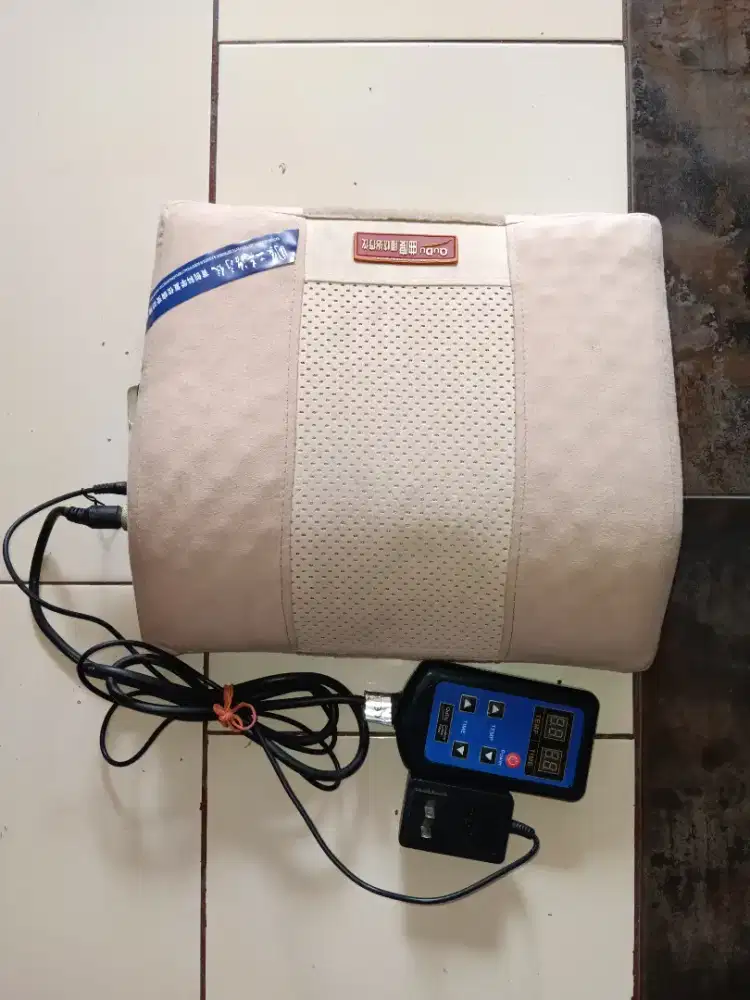 Alat pemanas punggung