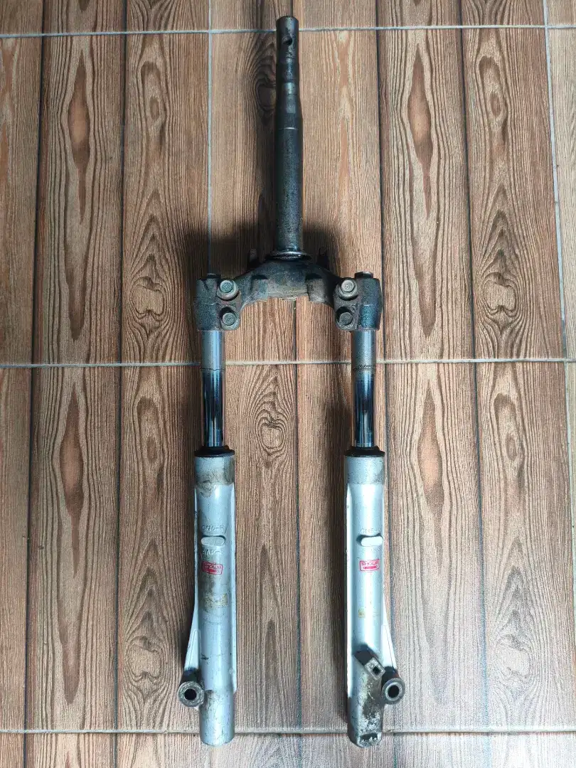 Halu Halu Segitiga Shockbreaker Depan Supra Fit Lama Tromol