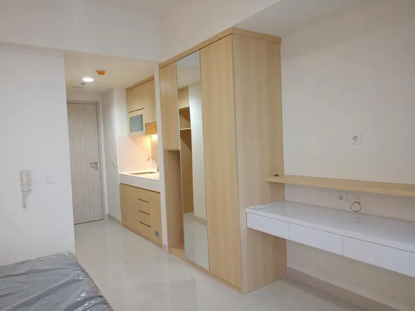 Disewakan Apartemen Studio 31m² Orange County Lippo Cikarang, 65 JT/Th