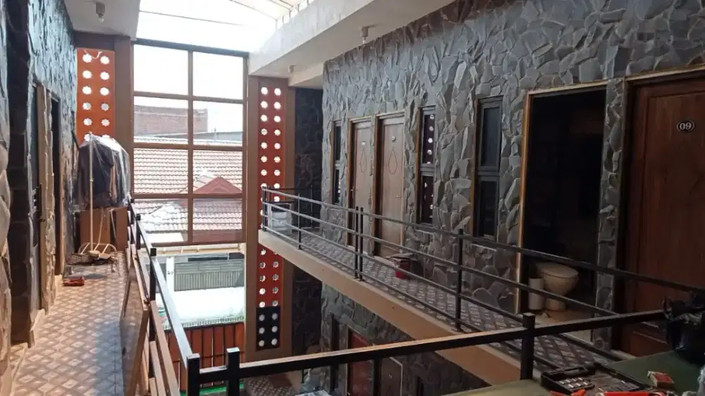 Tukang bangunan harian dan borongan