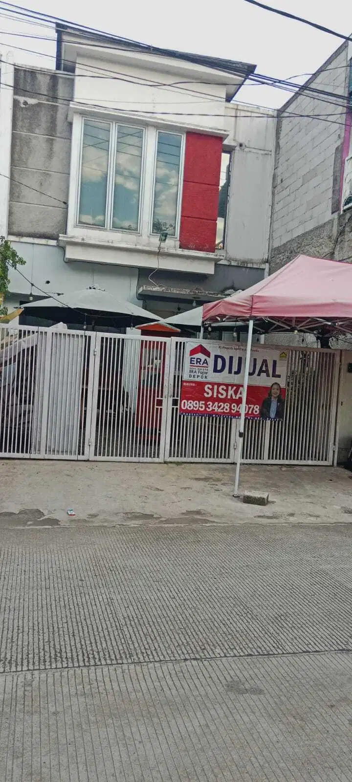 Dijual murah rumah 2 lt dipinggir jl boulevard sebelah alun alun depok