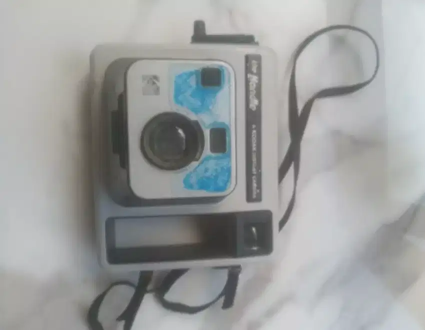 The handle A instant Kodak camera