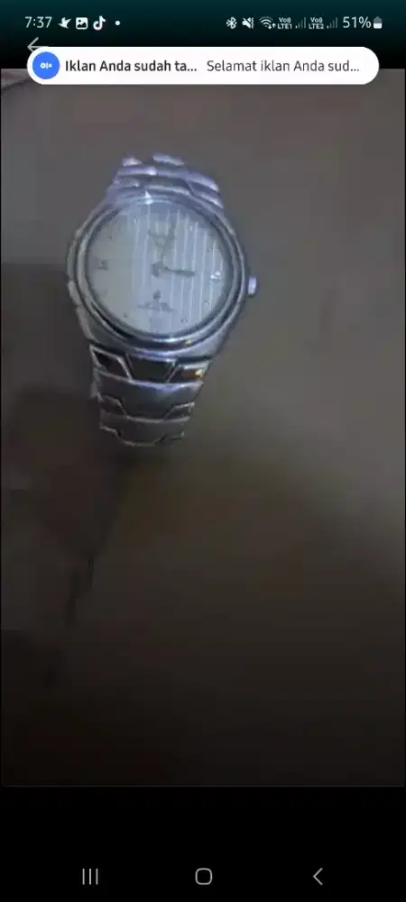 Jam Alexander Christy wanita