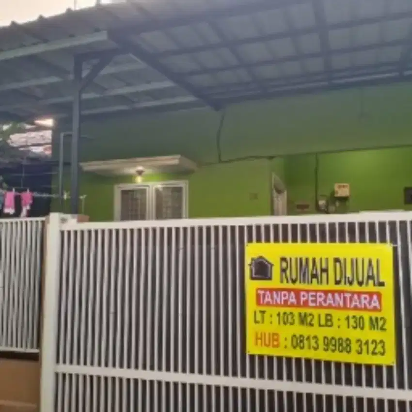 Rumah pinggir Jalan Raya