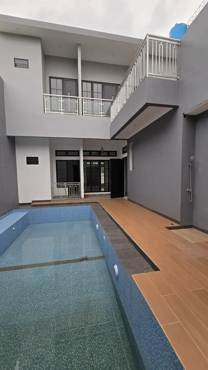 RUMAHGRIYA LOKA FULL RENOV SIAP MASUK KOLAM RENANG ,DEPAN JALAN LEBAR