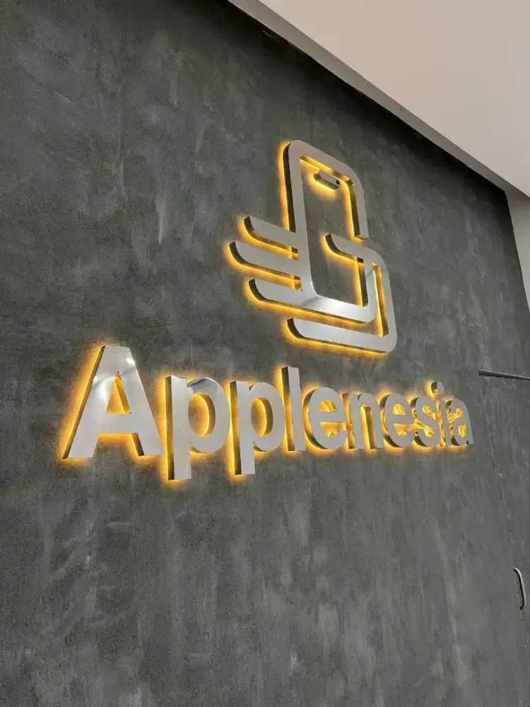 Huruf timbul galvanis nyala belakang