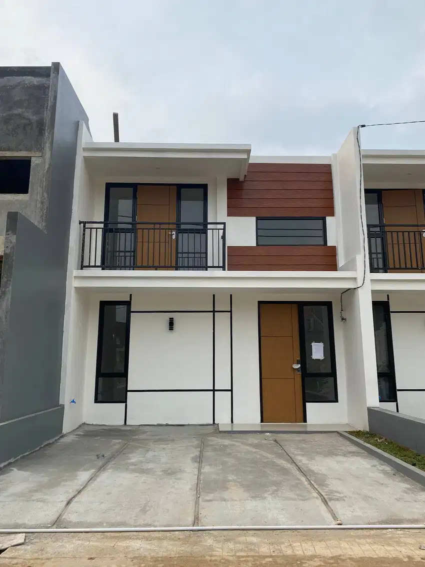 Rumah tampak 2 lantai harga 1 lantai deket stasiun depok lama