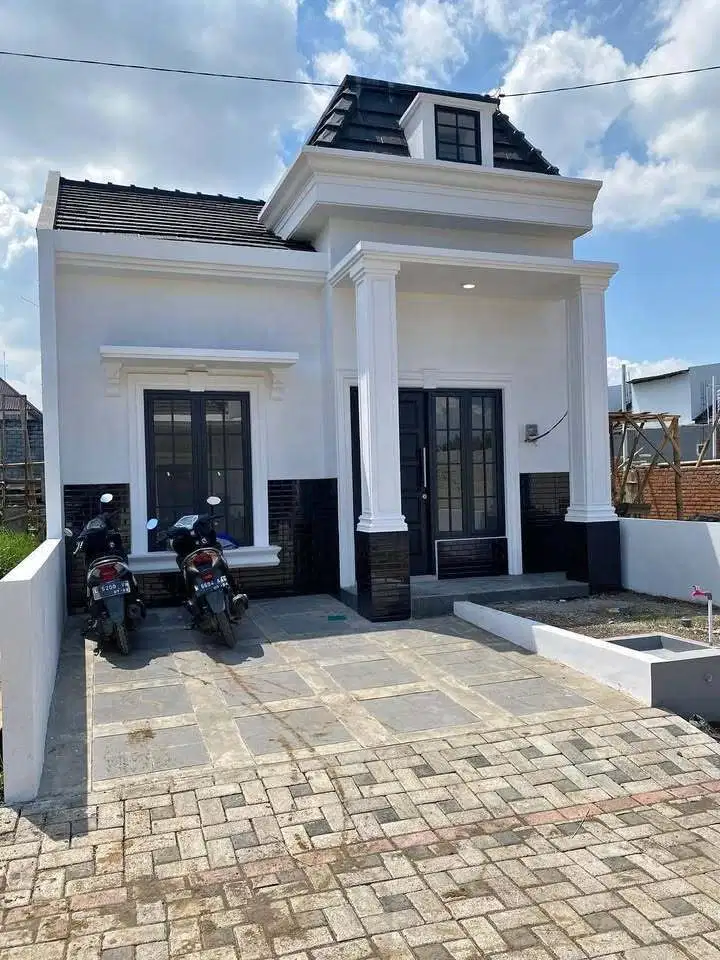 RUMAH AMERICAN CLASSIC LOKASI POROS JALAN KEPUHARJO KARANGPLOSO MALANG