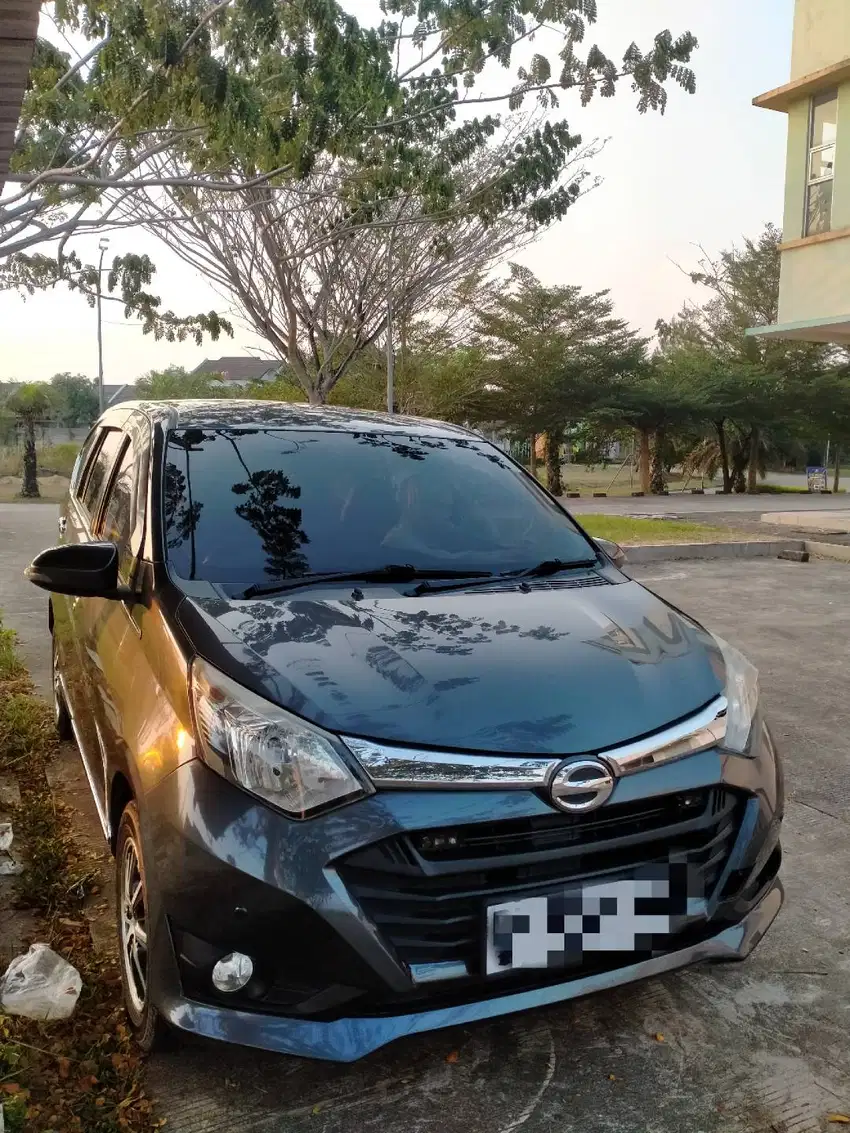 Sigra type R 1.2 abu-abu metalik