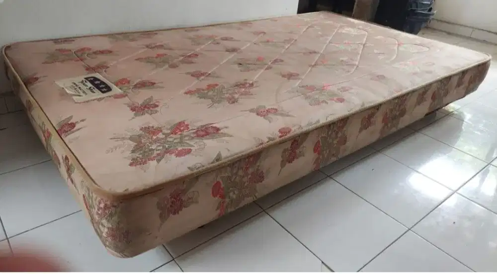 Tatakan spring bed single