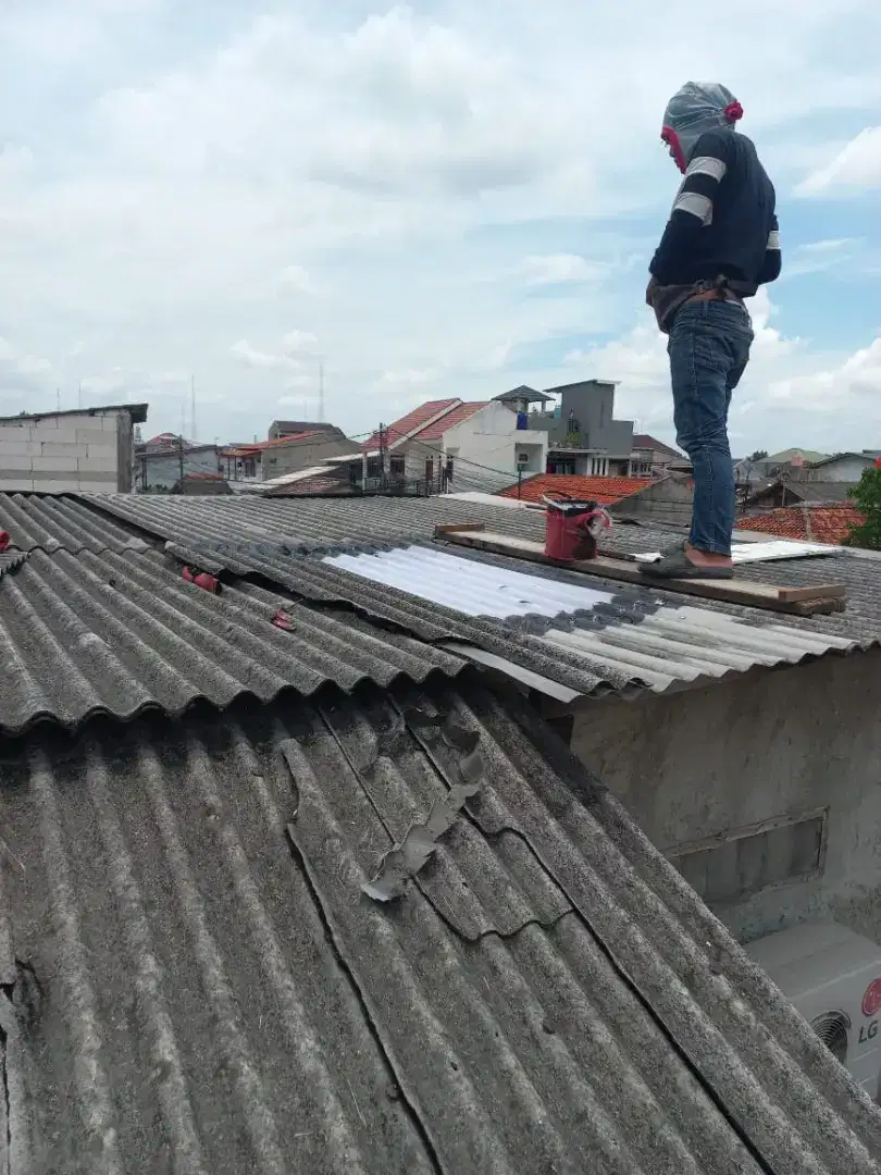 Tukang bangunan,renopasi,perbaikan atap bocor,dag,talang,kanopi,dll
