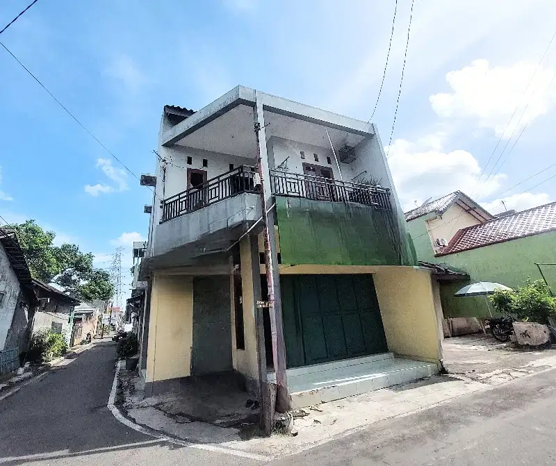 rumah usaha pinggir jalan tengah kota solo jajar dekat mall