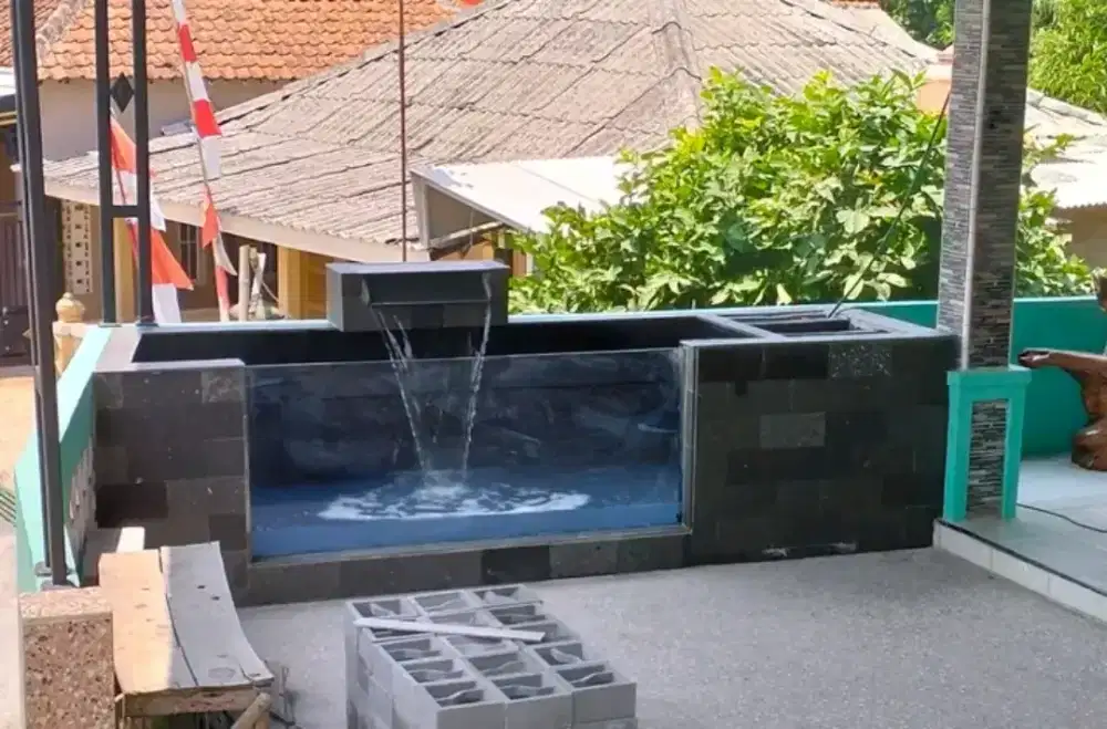 Pembuatan kolam dan taman hijau