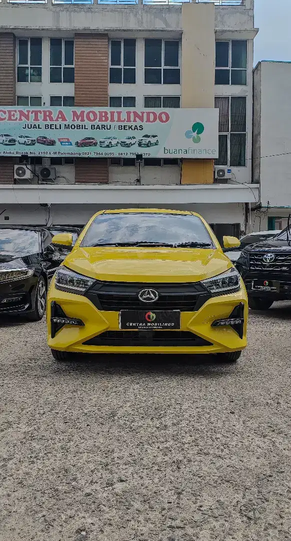 Ayla R 1.2 MT 2023 kuning istimewa dp 15 jt