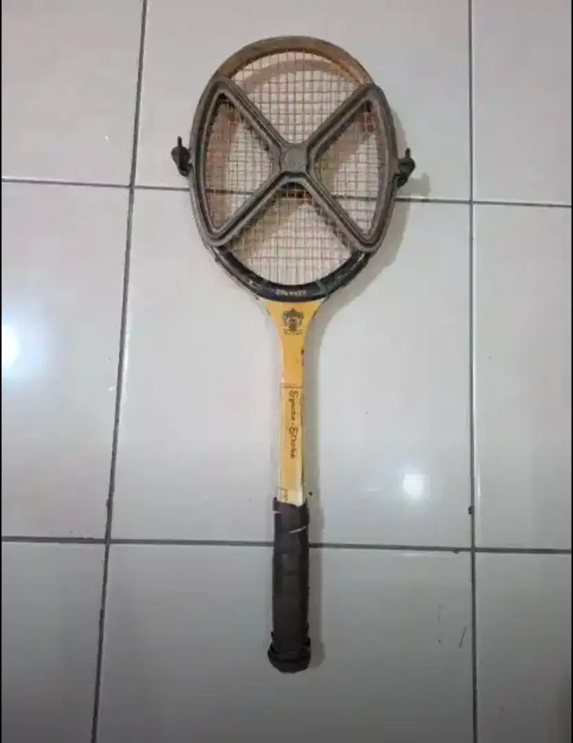 Raket Tenis Spanker syncro stroke plus cover Besi