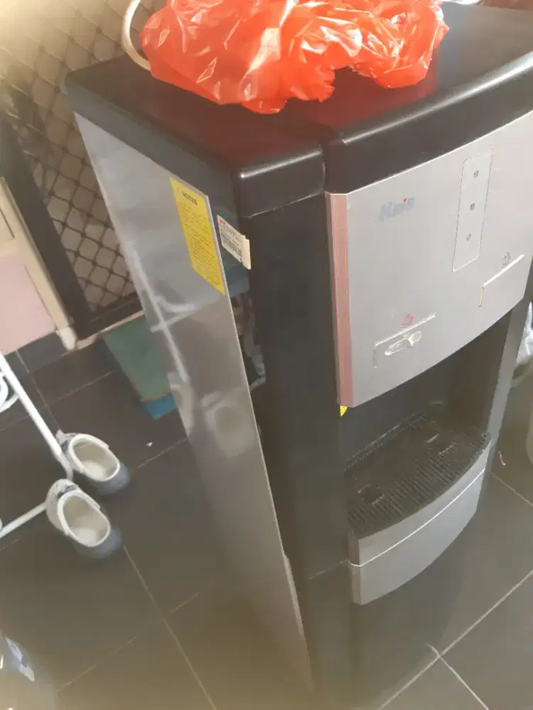 Dispenser kris top loading