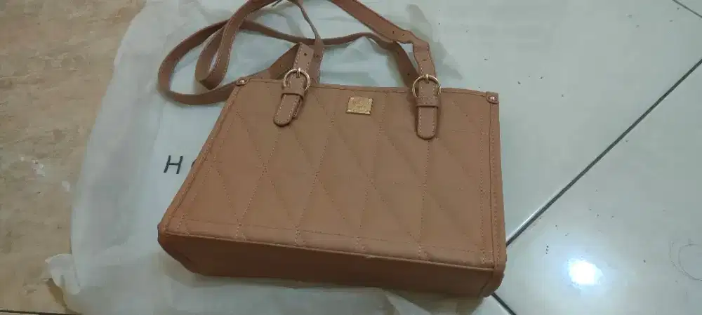 Tas Hon Yan masih baru.