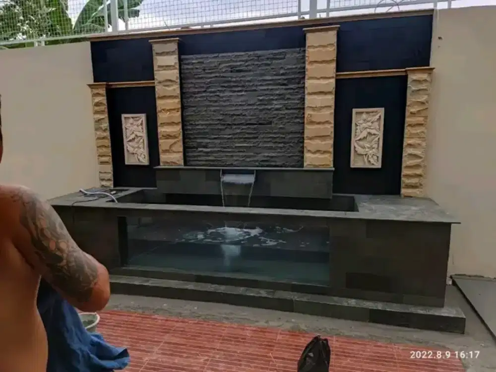 Seni taman dan kolam batu alam