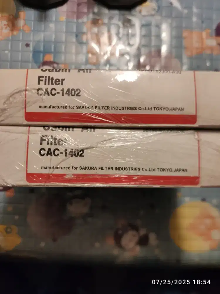 Filter kabin ac Sakura dan lampu stop rem Ertiga lama