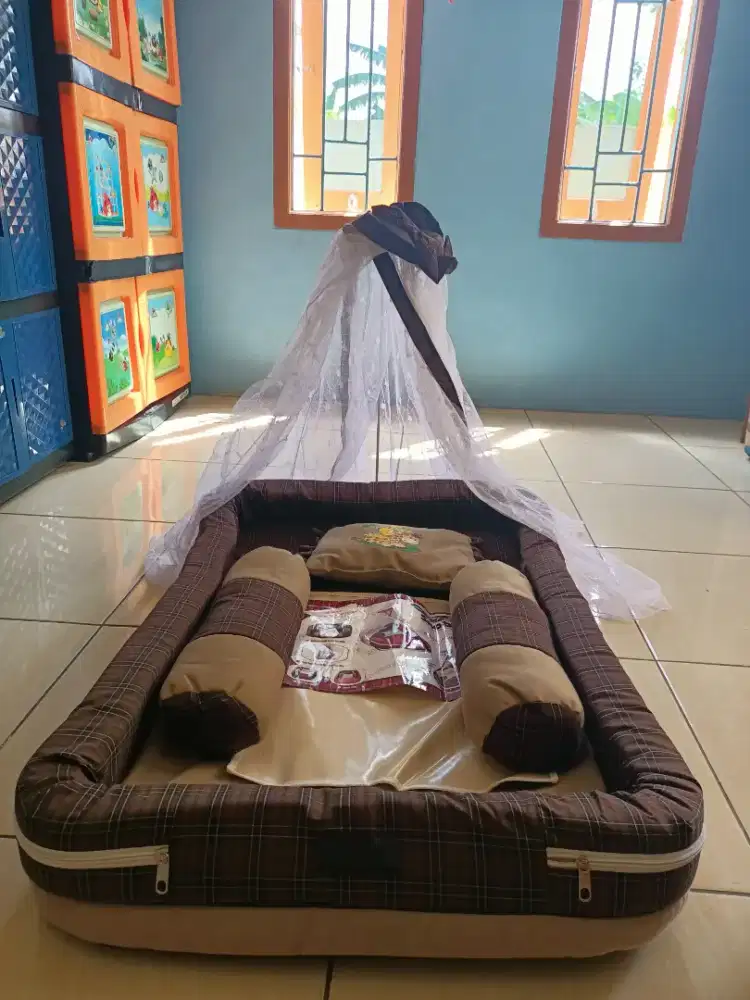 Tempat tidur bayi snooby