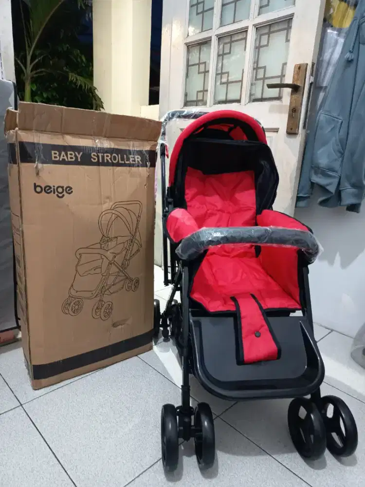 BEIGE BABY STROLLER