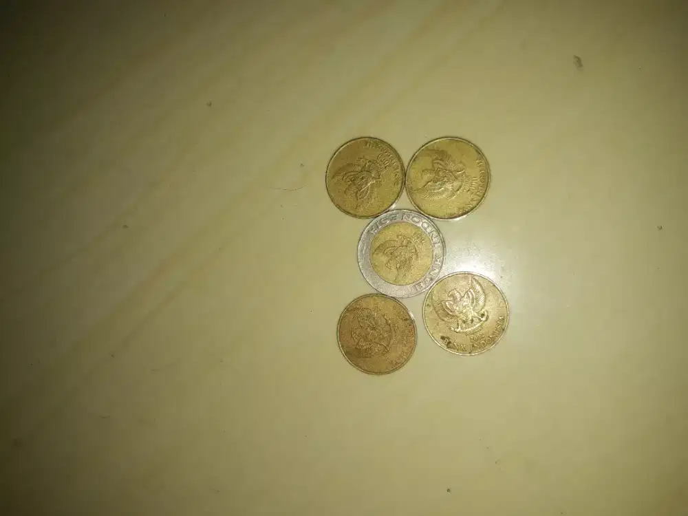 Uang koin 500 sama seribu